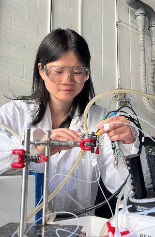 Dr. Nini Zhang works in the lab.